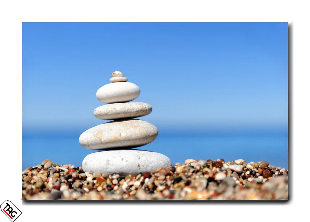 Balanced Serenity - Stacked Stones by the Sea